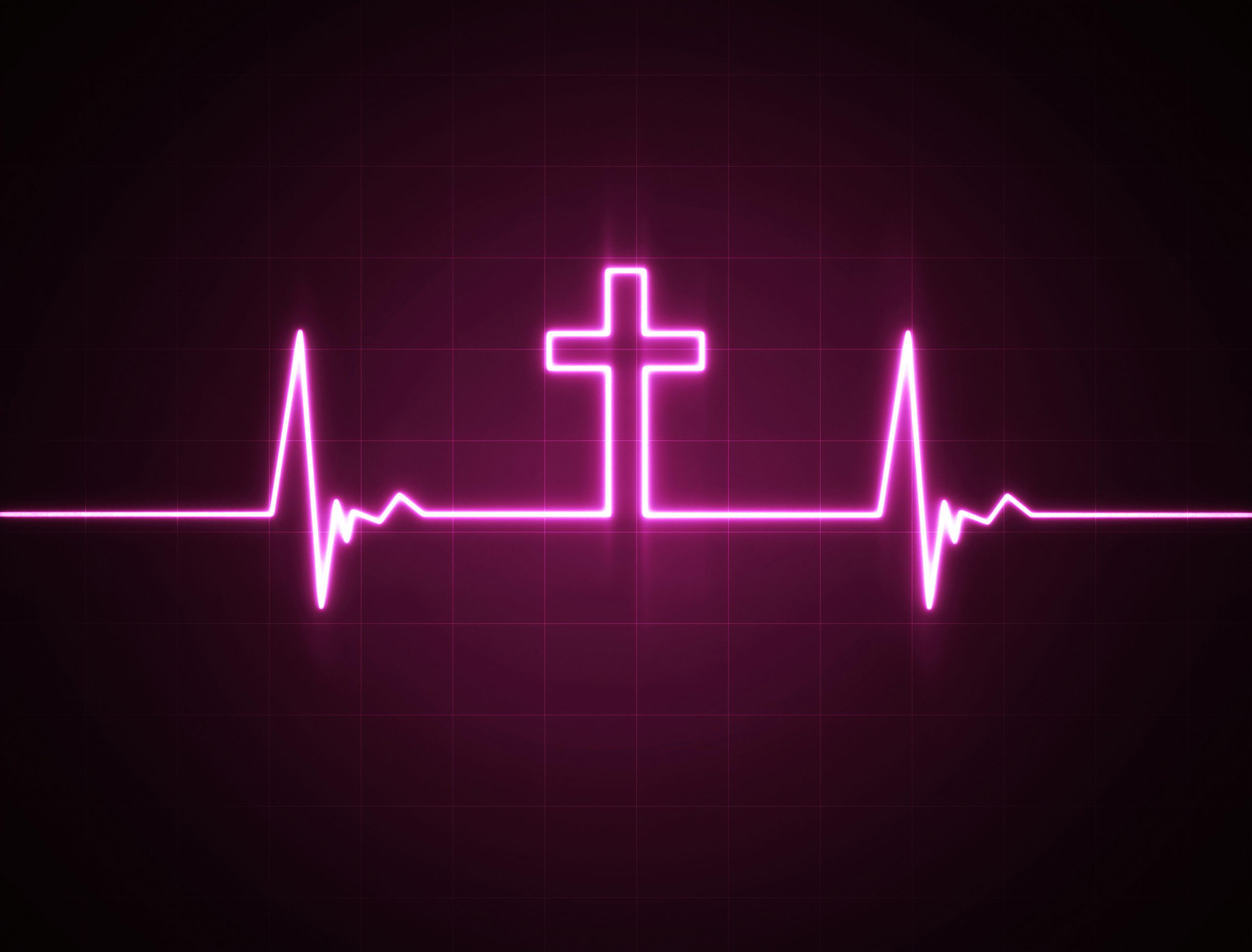 A heart rate monitor with a Christian cross symbol.